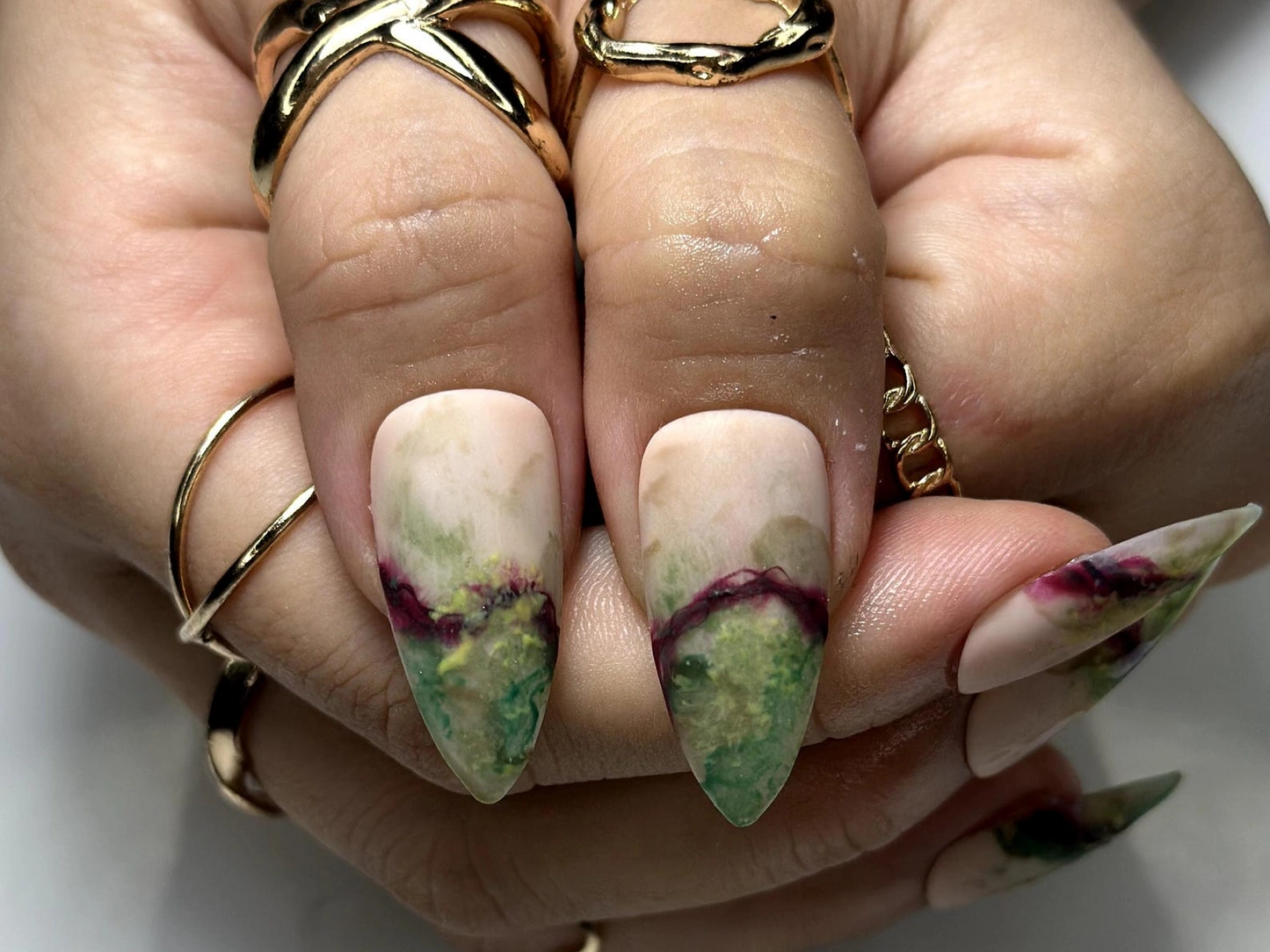 Maroon Nail Art With Marbled Veins
