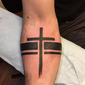 Arm Tattoos For Men Cross: Bold And Faithful Ink