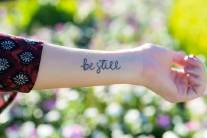 24 Be Still Tattoo On Wrist: Quiet Empowerment