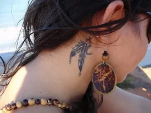13 Elegant Behind The Ear Feather Tattoos: Serenity
