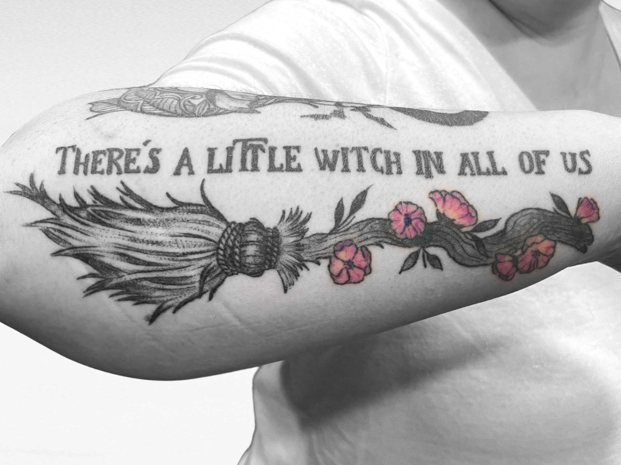 Black And White Tattoo With Pop Of Color