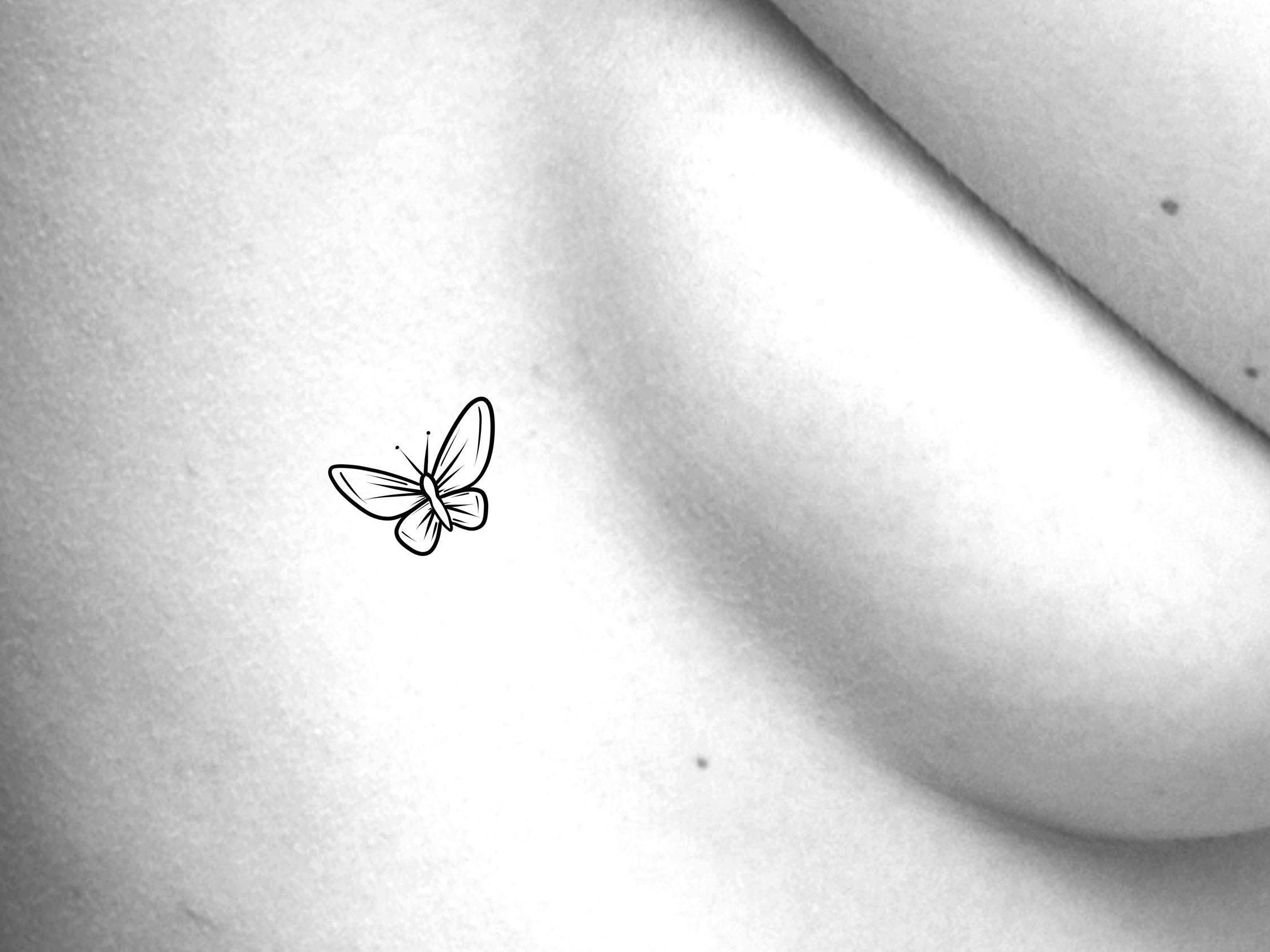 Butterfly Tattoos On The Breast