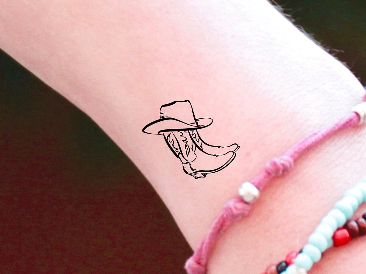 Cowboy Hat And Boots Tattoo