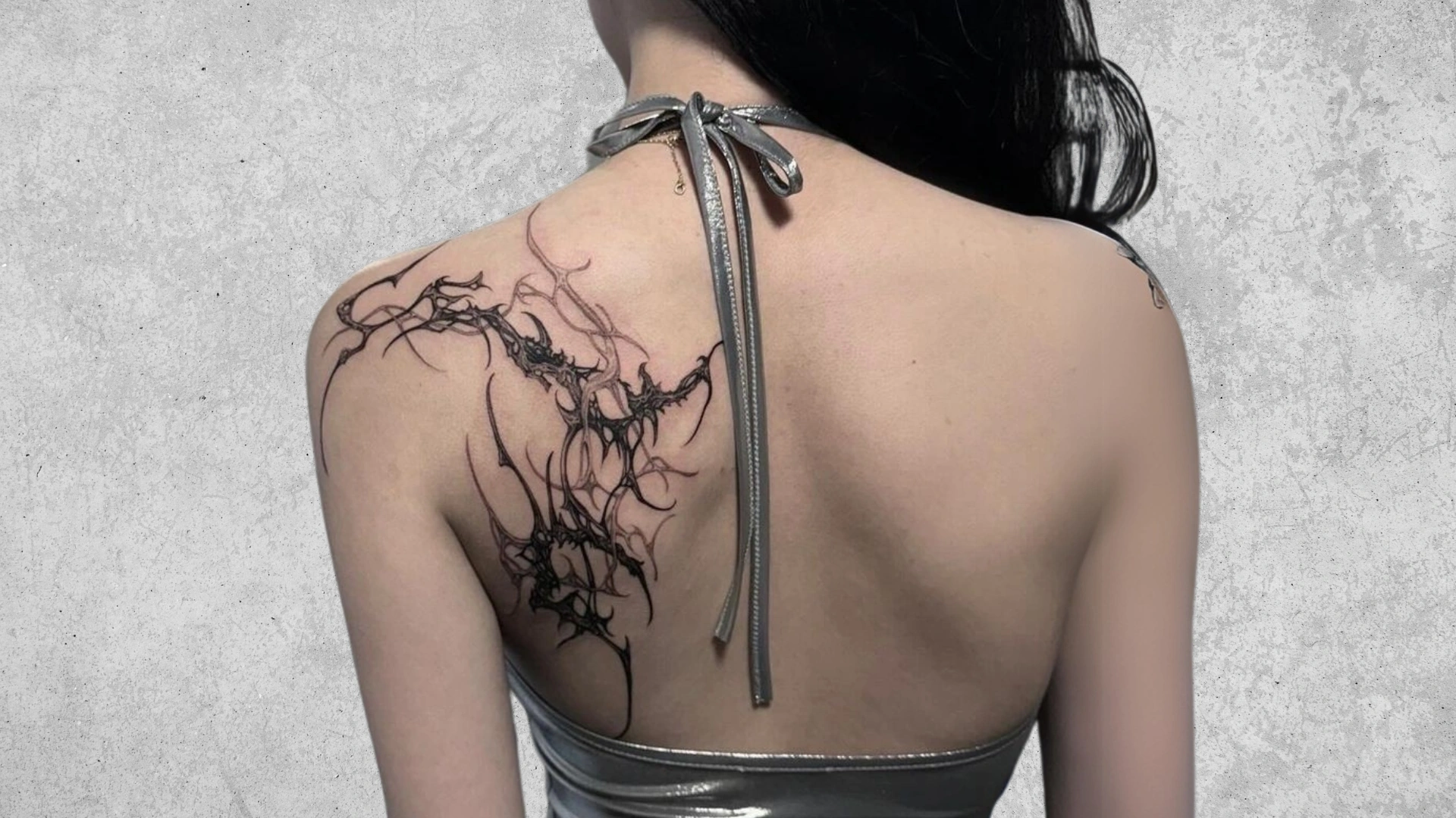 12 Bold Cyber Sigilism Lower Back Tattoo Designs Ignite