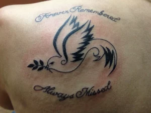 14 Inspiring Deceased Loved One Cardinal Flying Memorial Tattoo Designs
