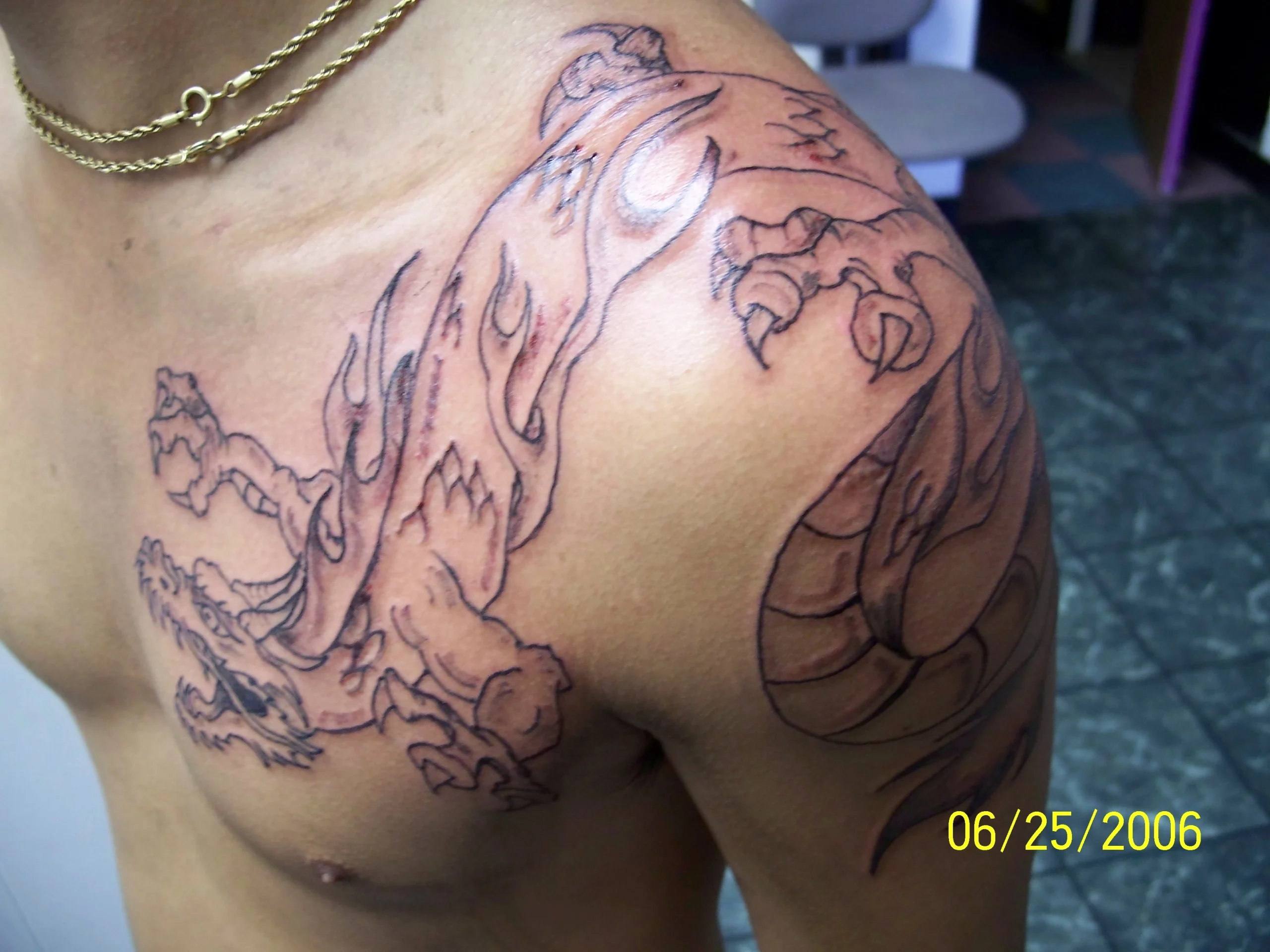 18 Fierce Dragon Shoulder Tattoo: Ignite Power