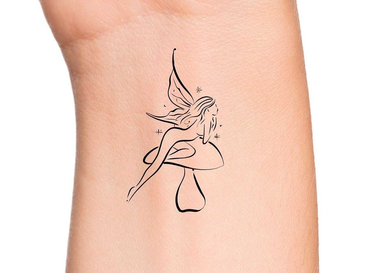 8 Enchanted Fairy On A Mushroom Tattoo: A Whisper