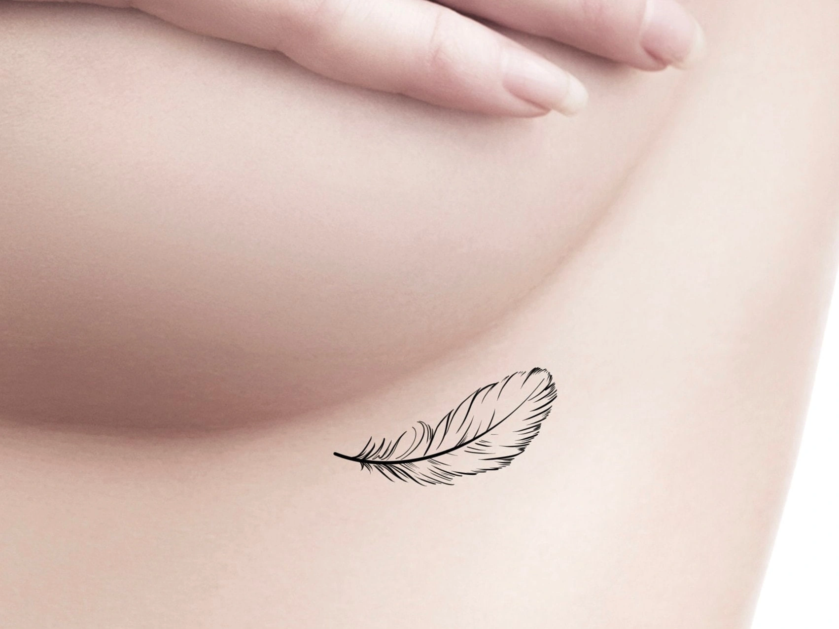 Feather Tattoo Ideas For Females