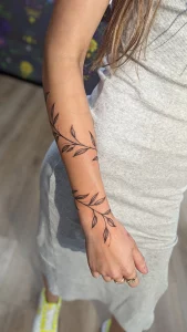 13 Stunning Floral Wrap Around Forearm Tattoo