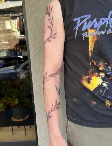 17 Flower Vine Wrap Around Arm Tattoo