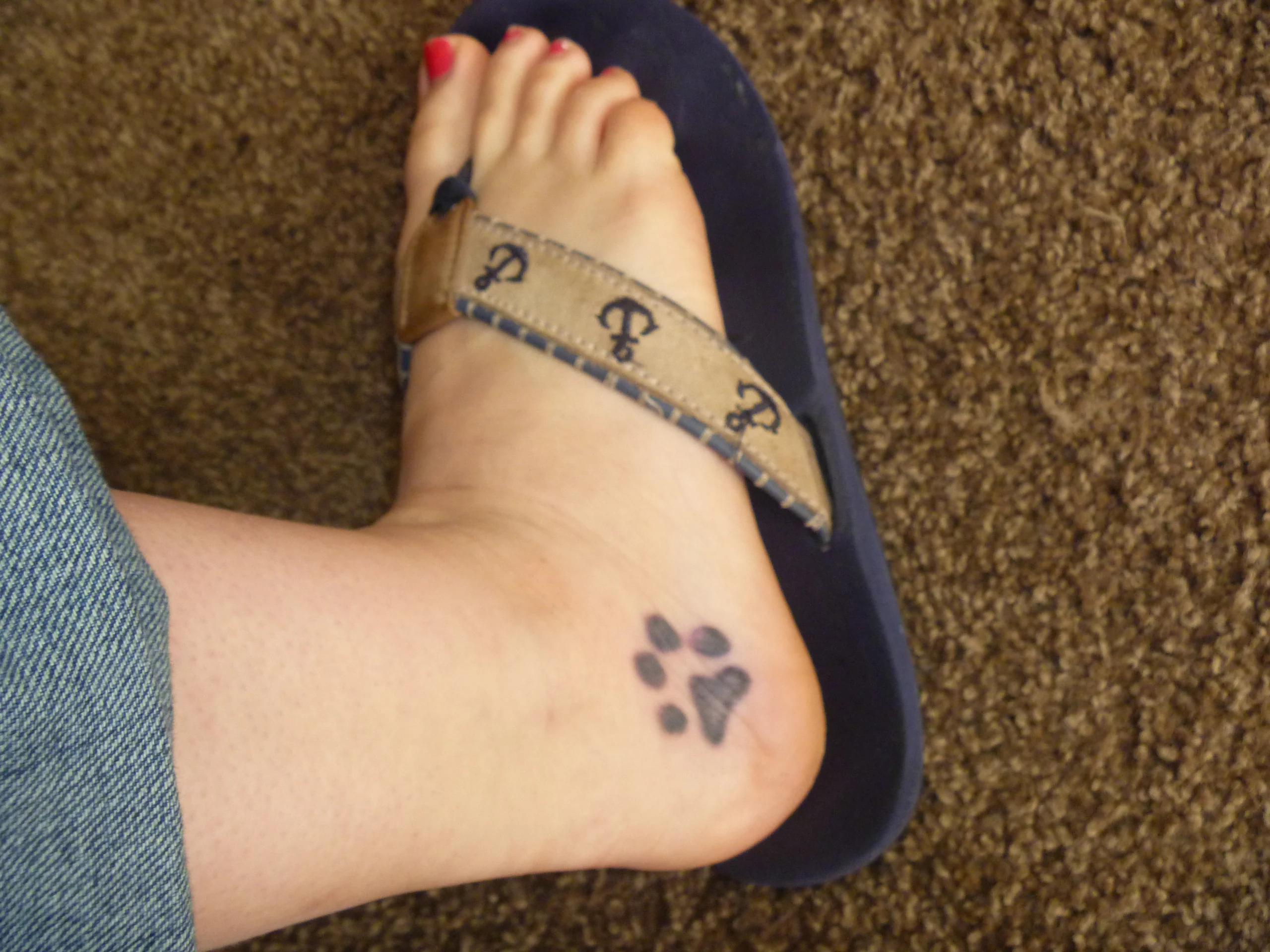 Paw Print Tattoo On Ankle