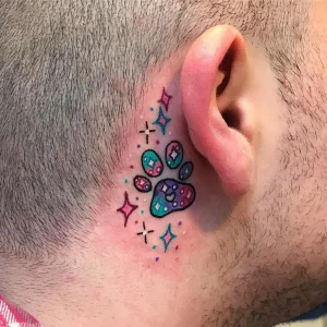 24 Bold Paw Print Tattoo On Thigh