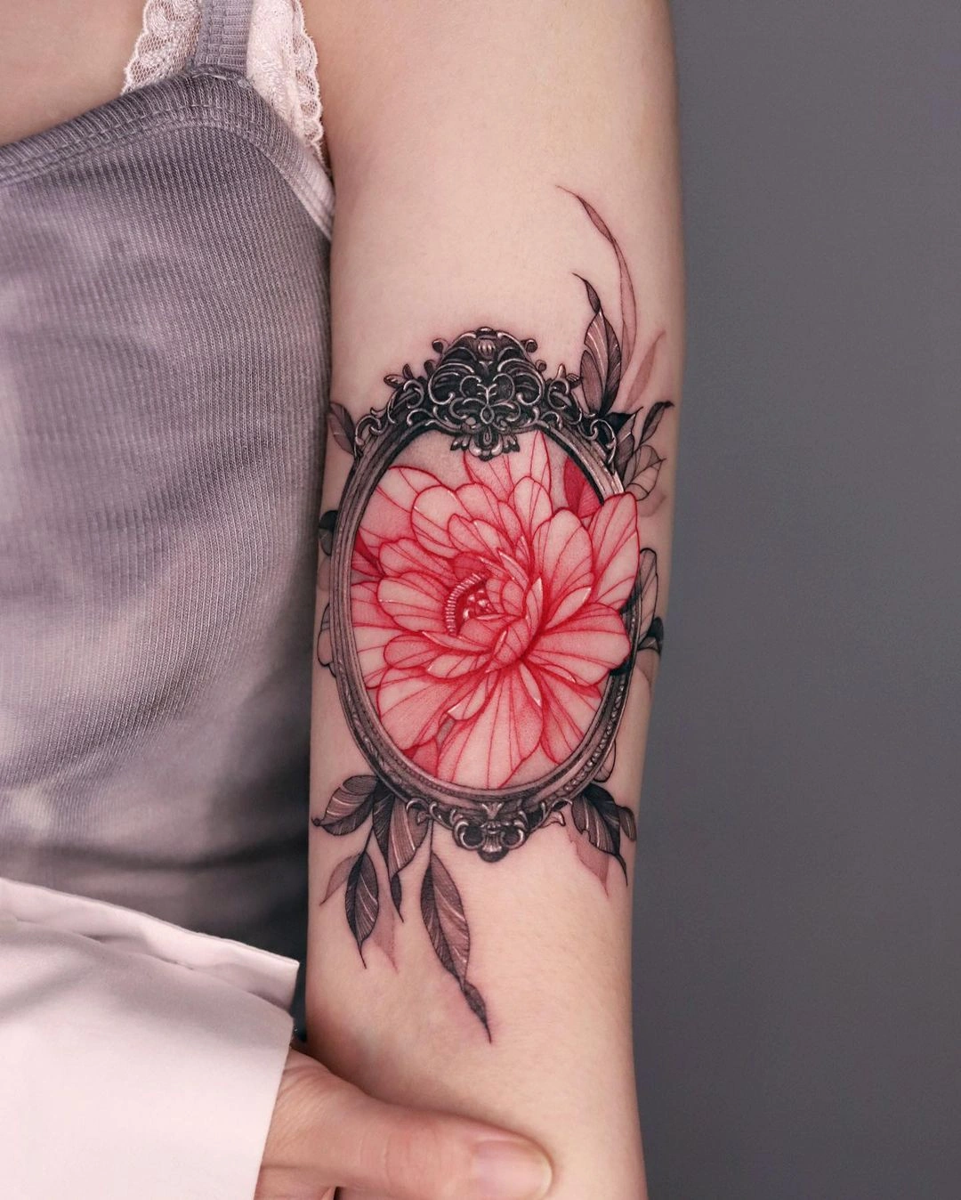 24 Graceful Red Ink Tattoos For Females: Bold Essence