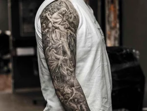 12 Faithful Religious Sleeve Tattoos For Men