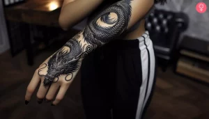 18 Bold Simple Dragon Wrapped Around Arm Tattoo