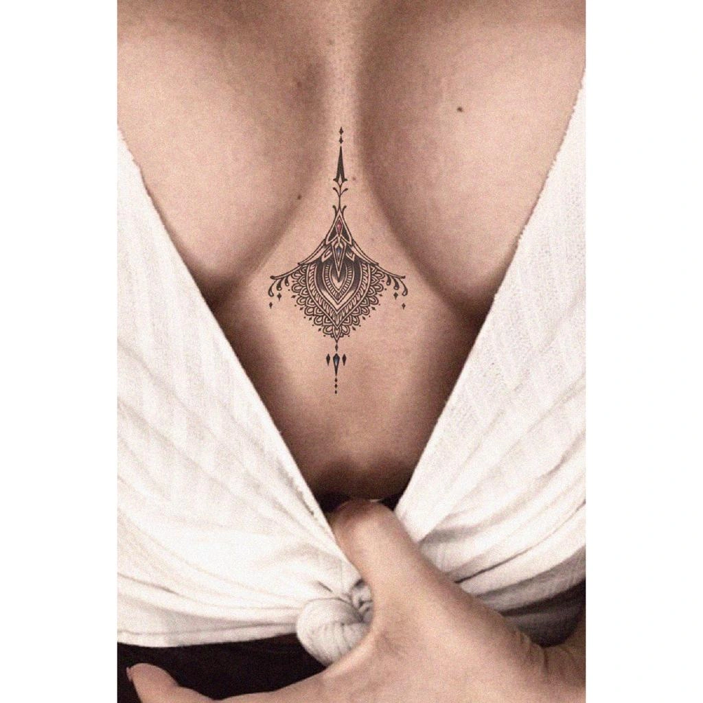16 Enchanting Tattoo On Top Of Breast: Bold Touch