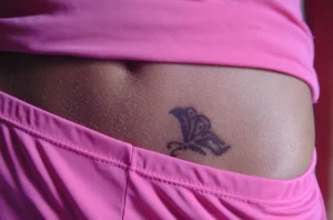 15 Tattoos On Stomach For Females