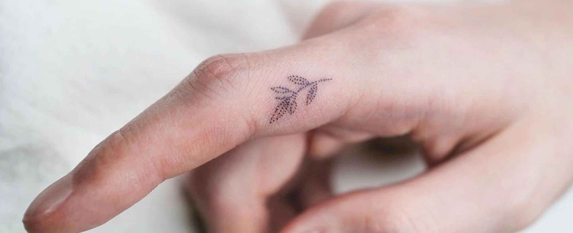 15 Elegant Tattoos On The Inside Of Fingers Revealed